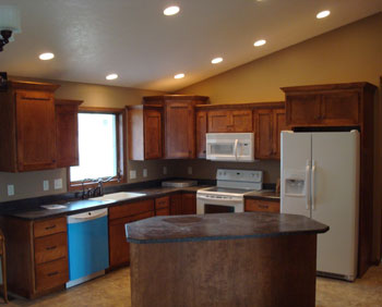 Impact Construction | Hull Iowa | Sioux County Construction near me | Remodeling my home | Updated kitchen with wood Cabinets